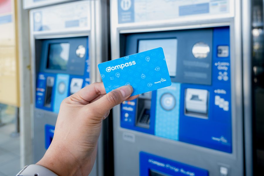 Compass-Card-in-front-of-two-Compass-Vending-Machines Compass-Card-in-front-of-two-Compass-Vending-Machines